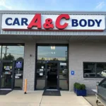 Modern and professional car body repair shop front.