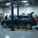 Car undergoing accident repair in a Bolton workshop.