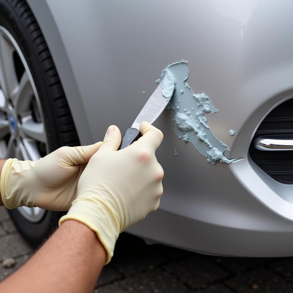 Applying Car Bumper Filler