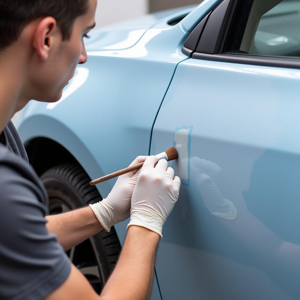 Applying touch-up paint to a car paint crack