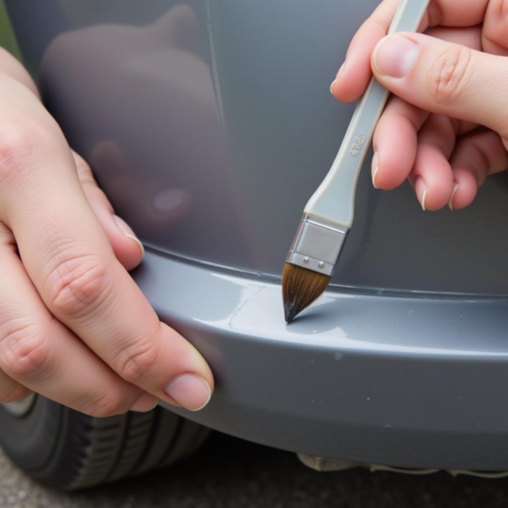 Applying Touch-up Paint to Car Bumper Scuff