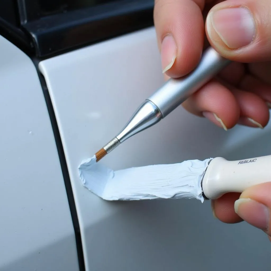 Applying Touch-Up Paint to Car Scratch