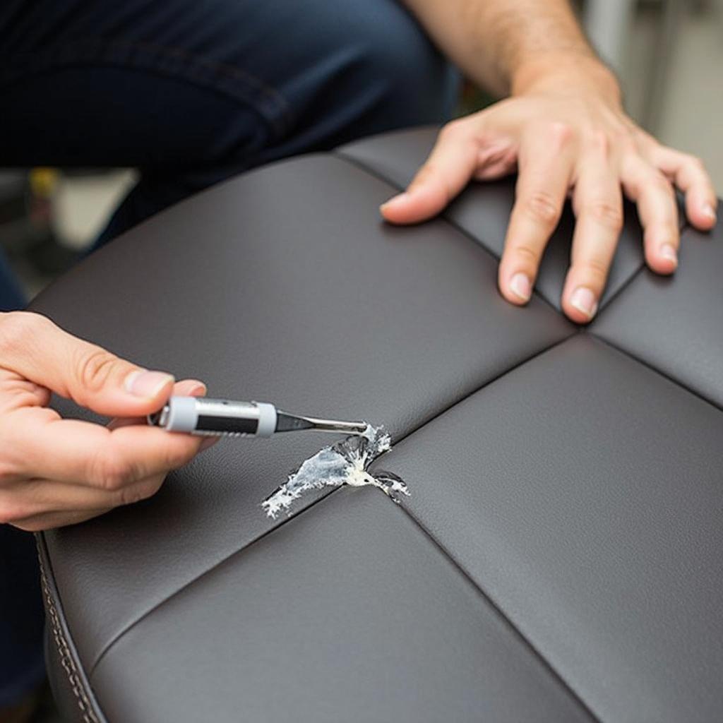 Applying Vinyl Filler to Car Seat Crack 