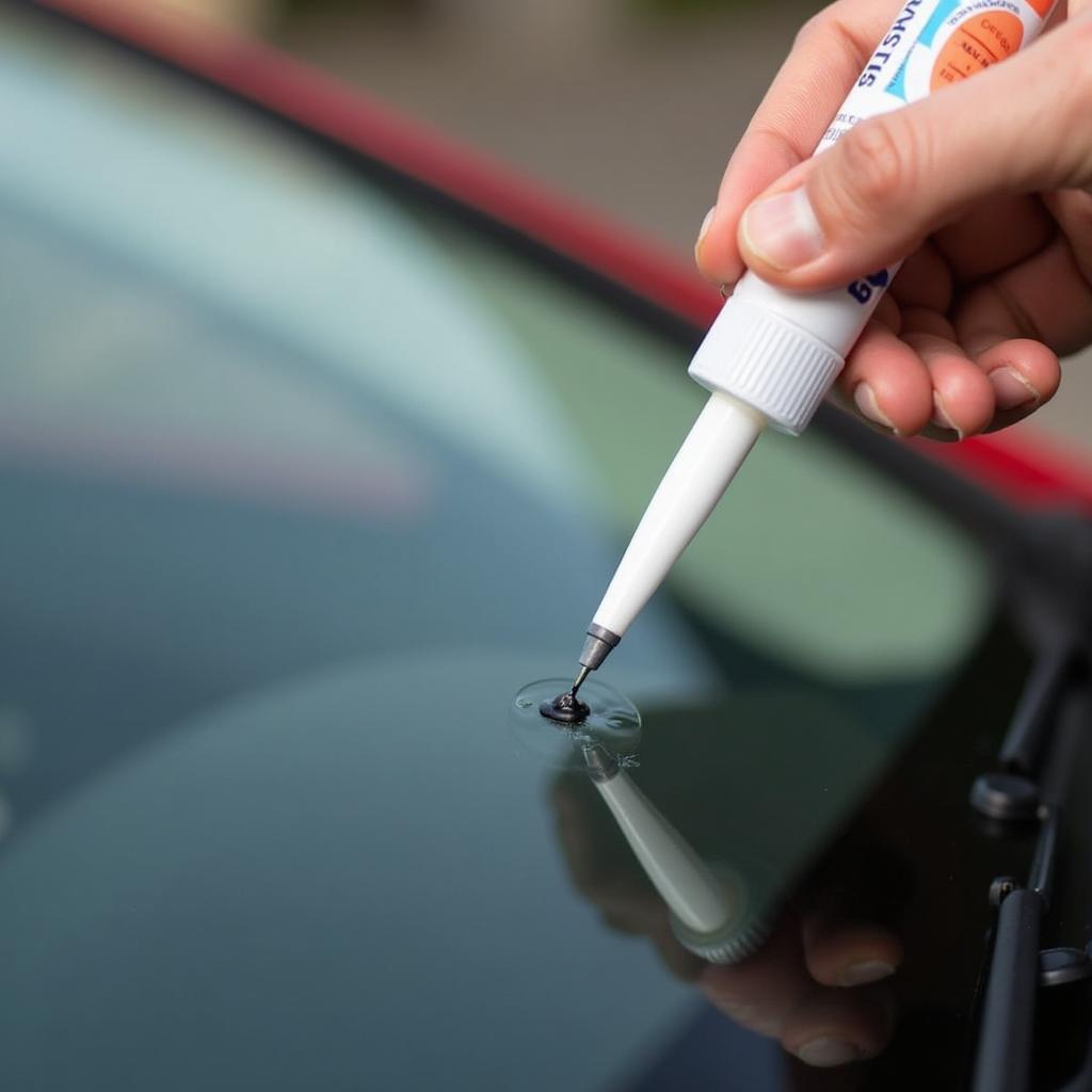 Applying Windshield Repair Resin 