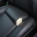 Torn leather car seat in an Audi A5