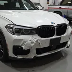 BMW with Collision Damage