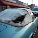 Car with Damaged Soft Top