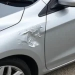 Car with body damage in Silkmere