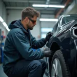 Car Body Repair Technician at Work