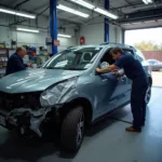 Car body repairs in progress at a professional workshop in Barking, Essex