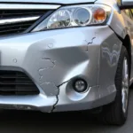 Close-up of Damaged Car Bumper