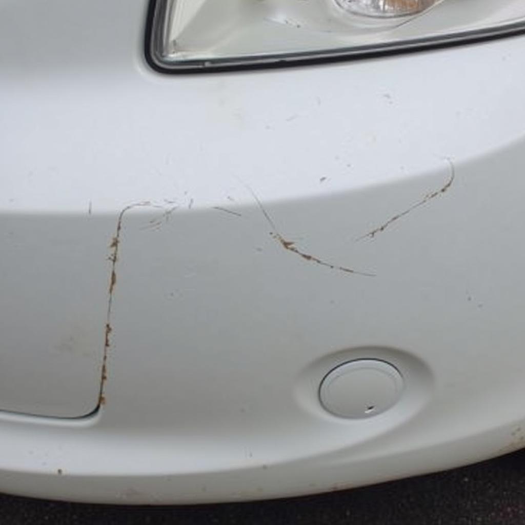 Car bumper with scratch damage in Crewe