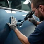 Car undergoing dent repair in Limavady