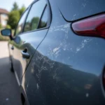 Close-up of a car key scratch