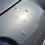 Close-up of car paint chip damage