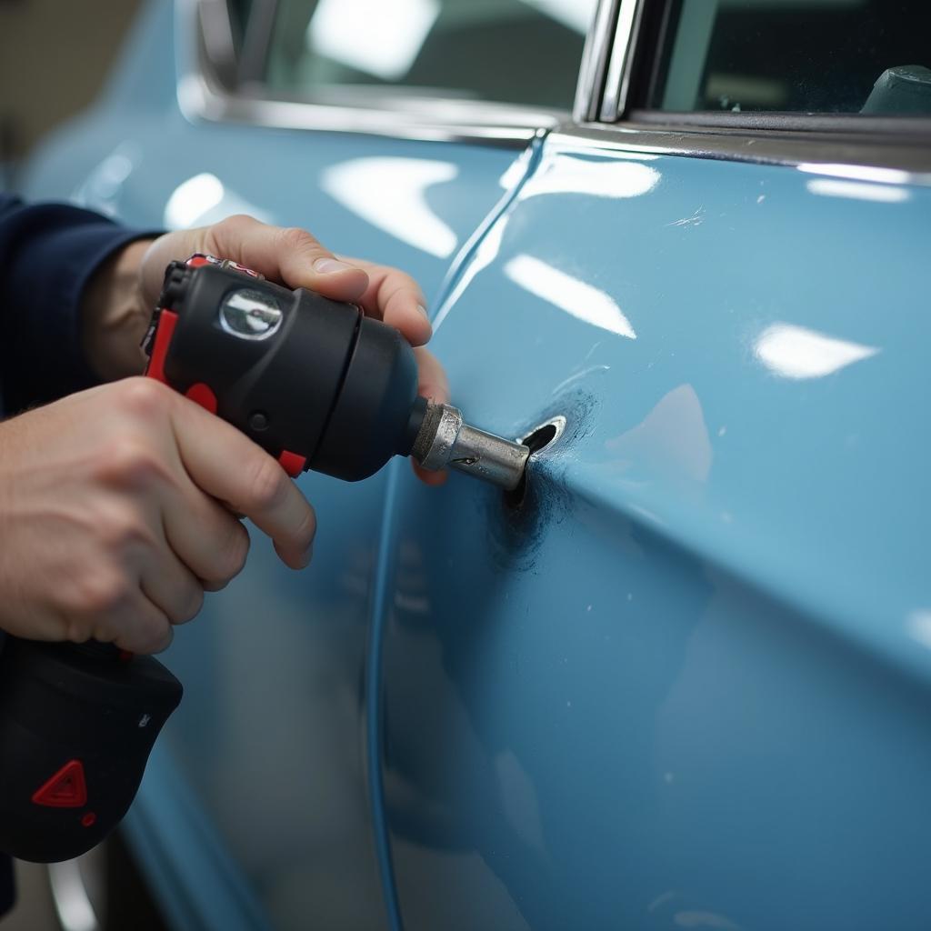 Car Paint Repair Technician at Work