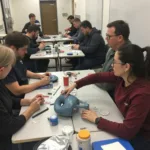 Students in a Car Paint Repair Training Class