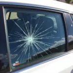 Car window with significant damage from a hailstorm in Alamosa