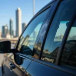 Car window with visible scratch in Dubai