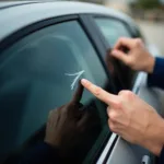 Inspecting a Car Window Scratch