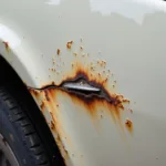 Classic Car Paint Chip with Rust Formation