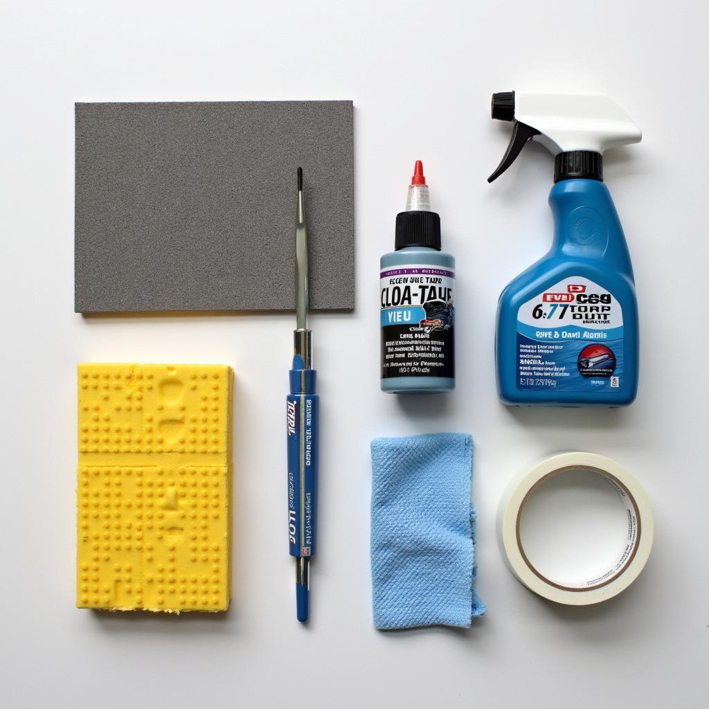  DIY car paint repair kit laid out on a workbench.