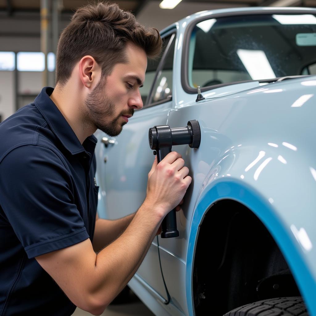 Inspecting Repaired Car Body