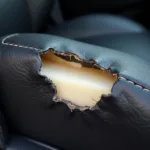 Damaged leather car seat