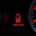 Car Dashboard Showing Low Oil Pressure Warning Light