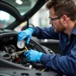 Mobile Car AC Repair Technician Checking Refrigerant Levels