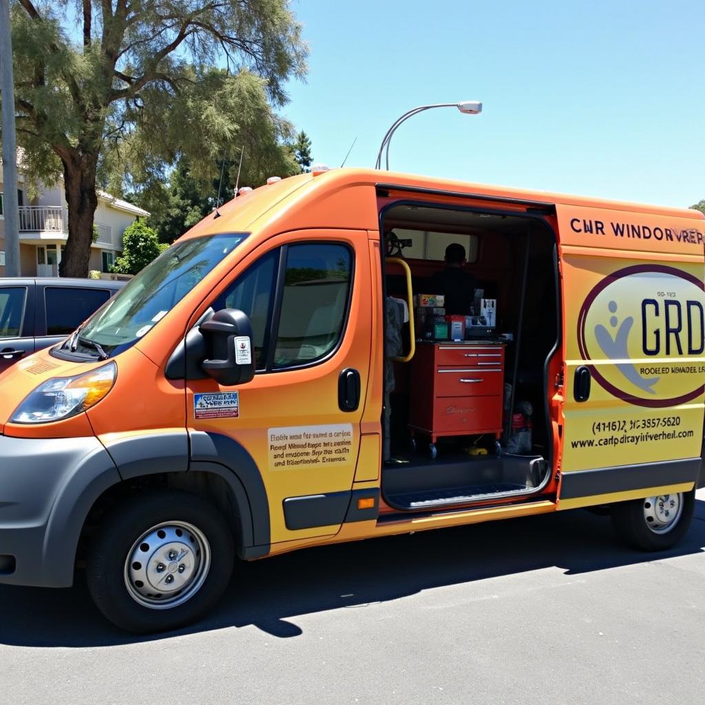 Mobile car window repair van parked on a sunny Los Angeles street