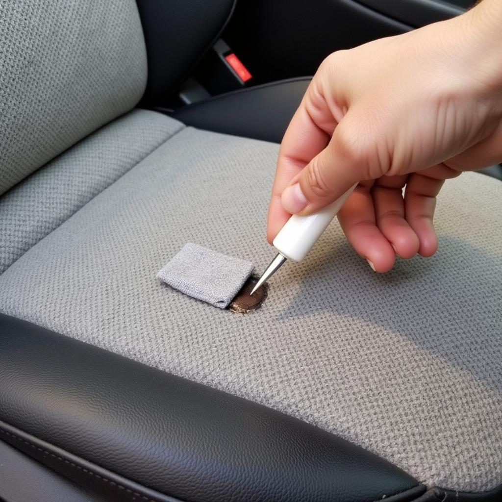 Patching a Small Burn Hole in Cloth Car Seat