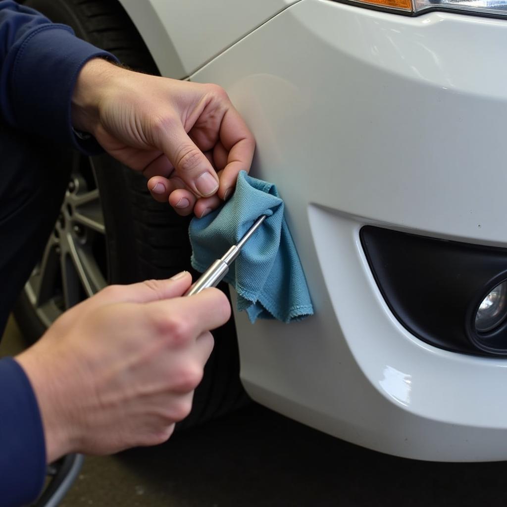 Paintless dent repair process on a car bumper in Knutsford