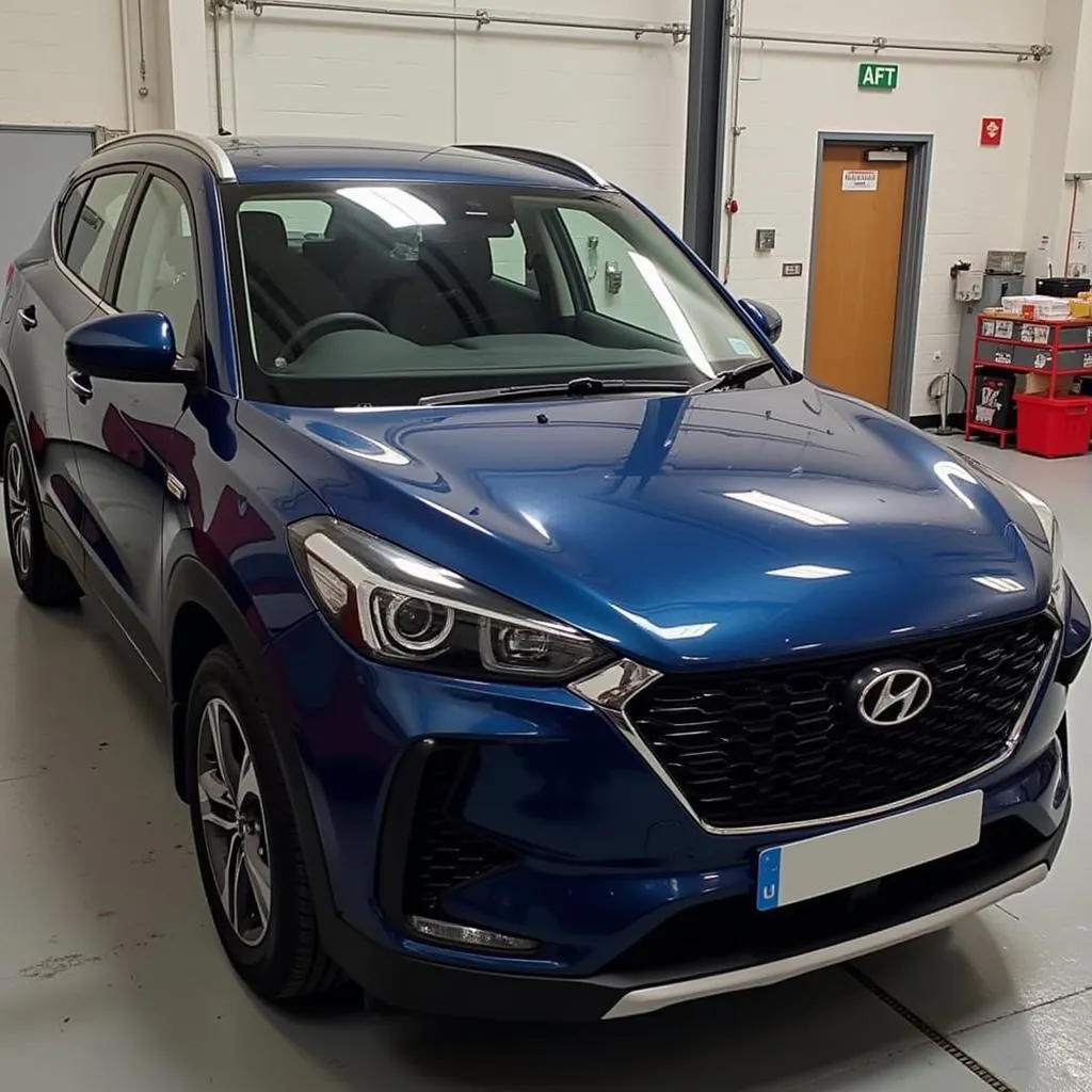 Shiny repaired car ready at a Leven garage