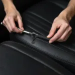 Repairing a hole in a leather car seat