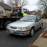 Repo agent towing a car