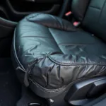 Squashed Leather Car Seat in a VW Golf