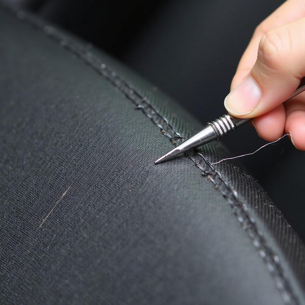 Stitching a Torn Car Seat