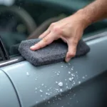 Applying Thin Rubber Dressing to Car Window Trim