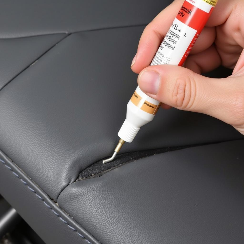 Applying Vinyl Repair Compound to a Car Seat Tear