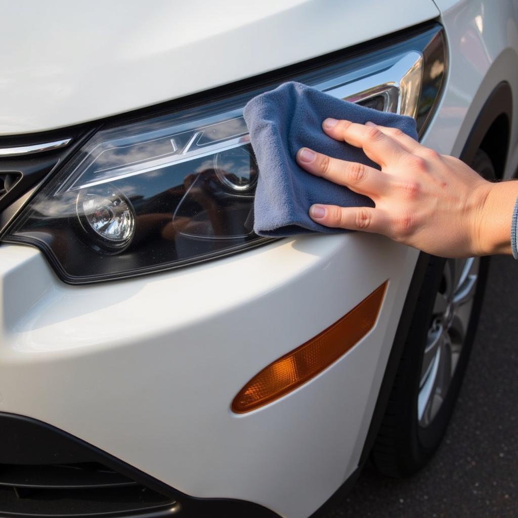 Waxing car bumper for protection