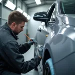 Experienced car paint repair technician working in Wilmslow