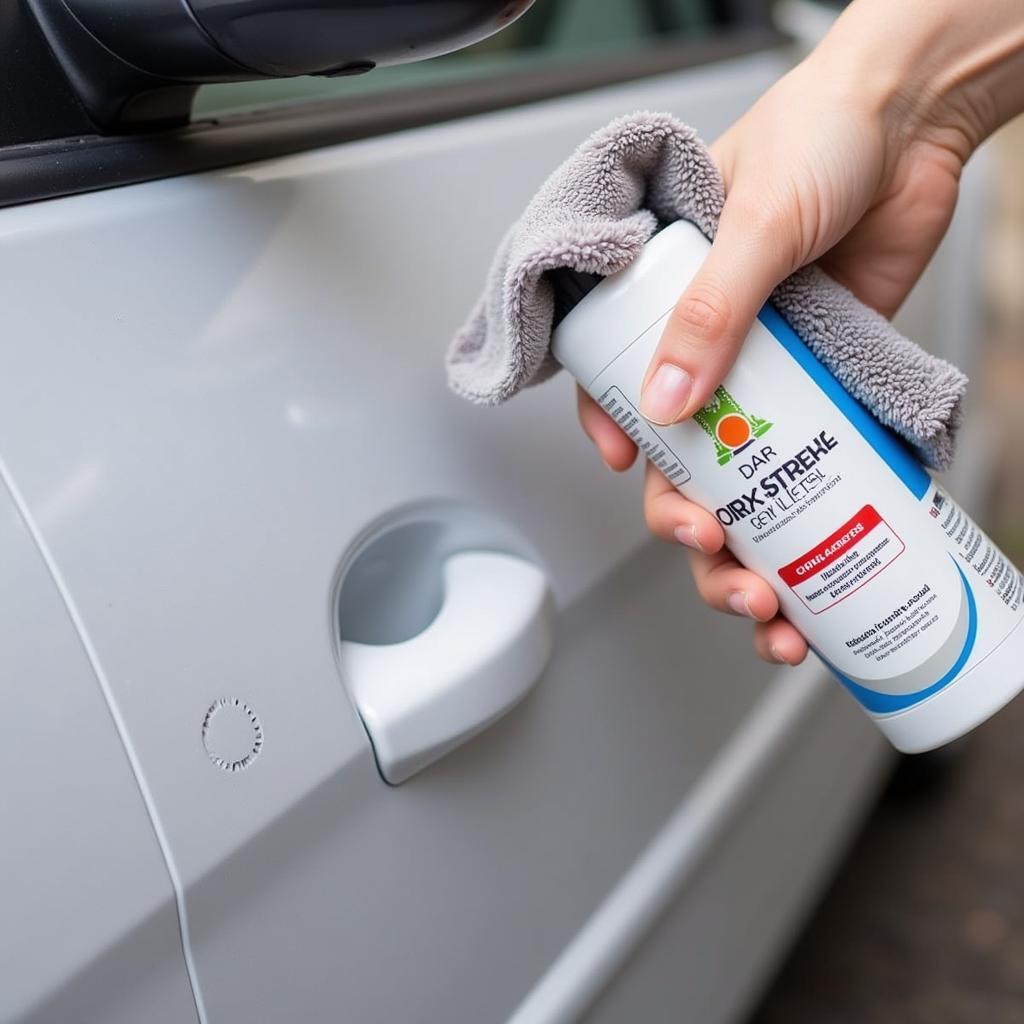 Applying Car Scratch Remover to a Key Scratch