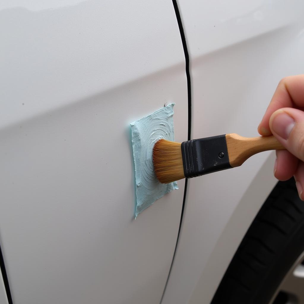 Applying Touch-Up Paint to a Car Chip