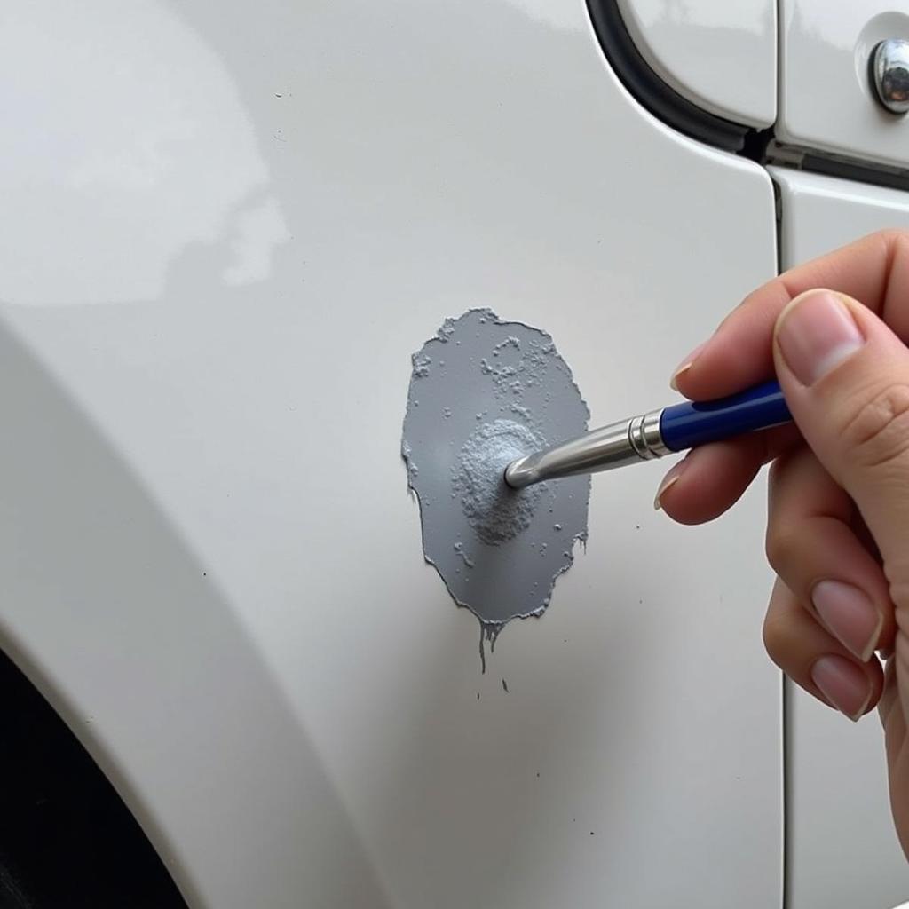 Applying Touch-Up Paint to a Car Paint Chip