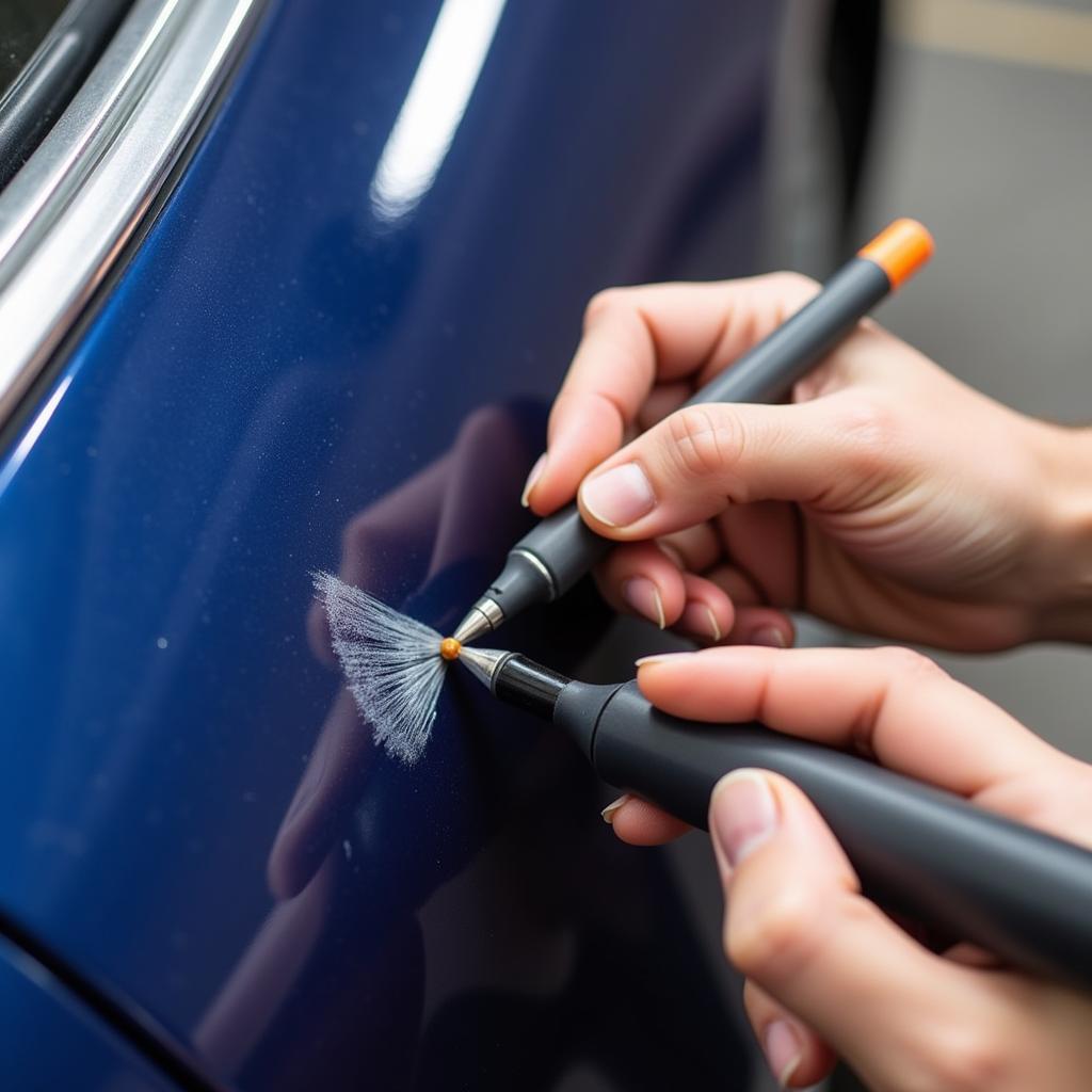 Applying Touch-Up Paint to Car Scrape