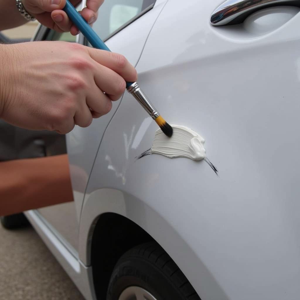 Applying Touch-up Paint to Car Scratch