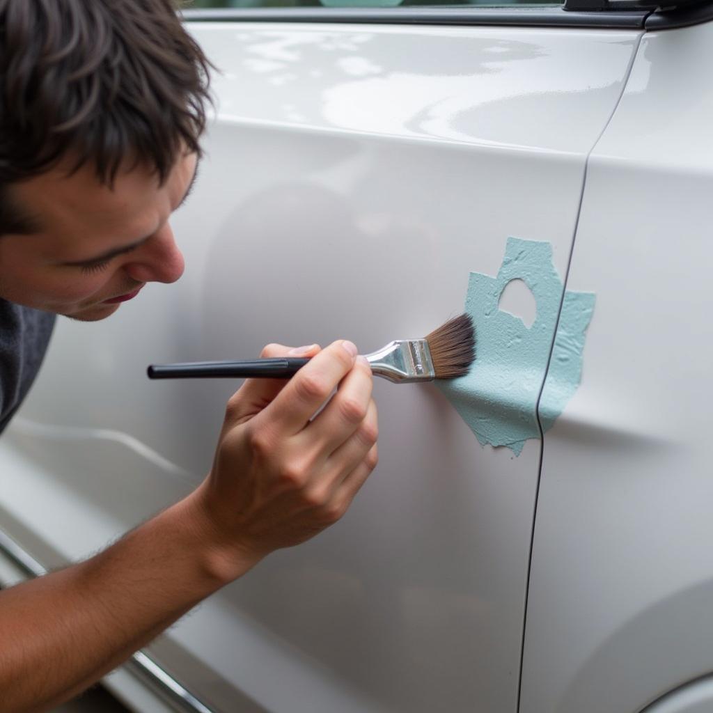 Applying Touch-Up Paint to Car Scratch