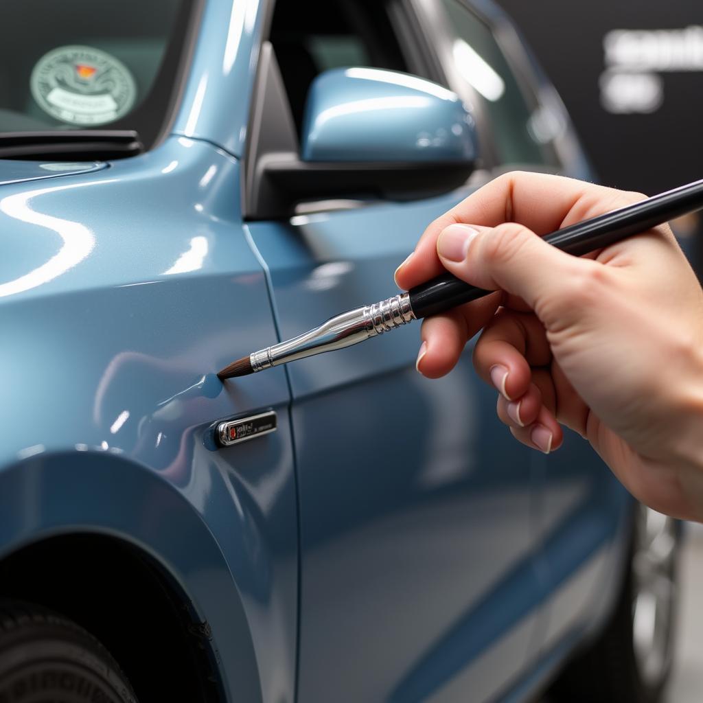 Applying touch-up paint to a car scratch with precision