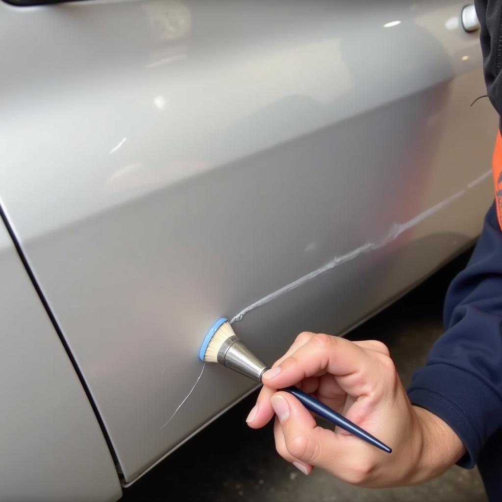 Applying Touch-up Paint to Car Scratch